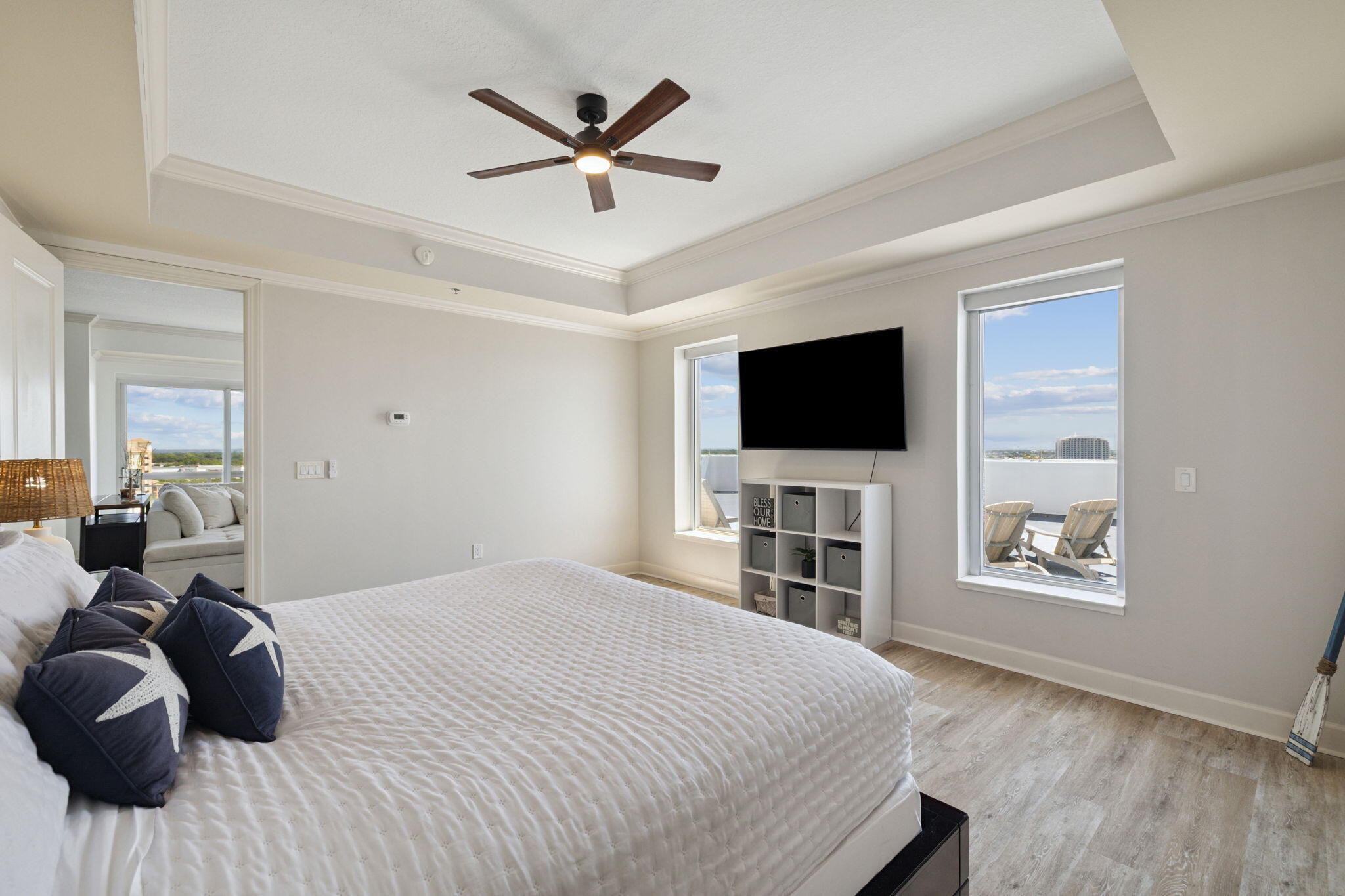 725 Gulf Shore Drive, Unit 902A Destin, FL 32541 - Photo 64 of 102 a bedroom with a bed and a flat screen tv