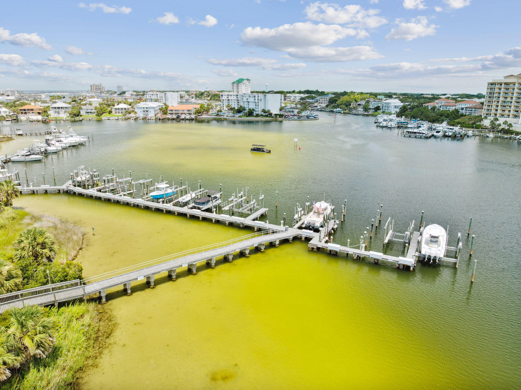 725 Gulf Shore Drive, Unit 902A Destin, FL 32541 - Photo 85 of 102 a view of a lake with boats and trees
