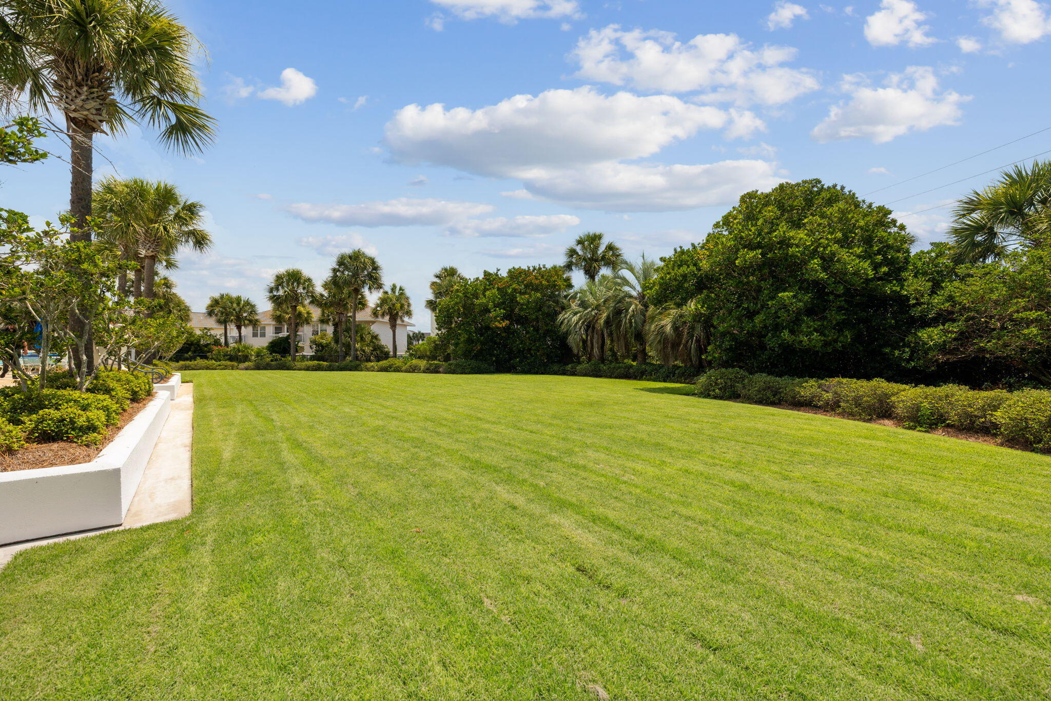 725 Gulf Shore Drive, Unit 902A Destin, FL 32541 - Photo 91 of 102 a view of yard with swimming pool and green space