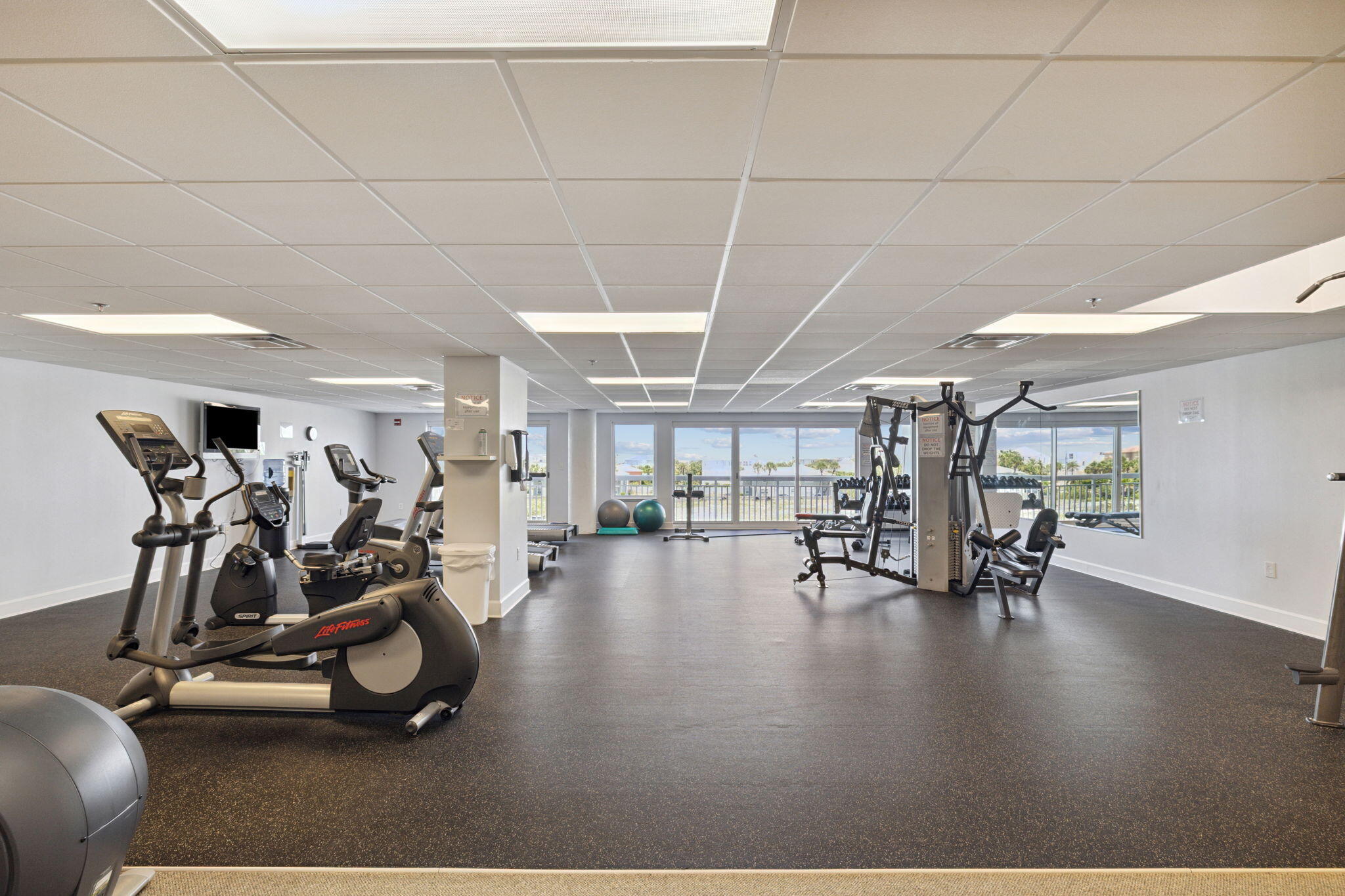 725 Gulf Shore Drive, Unit 902A Destin, FL 32541 - Photo 92 of 102 a view of a room with gym equipment