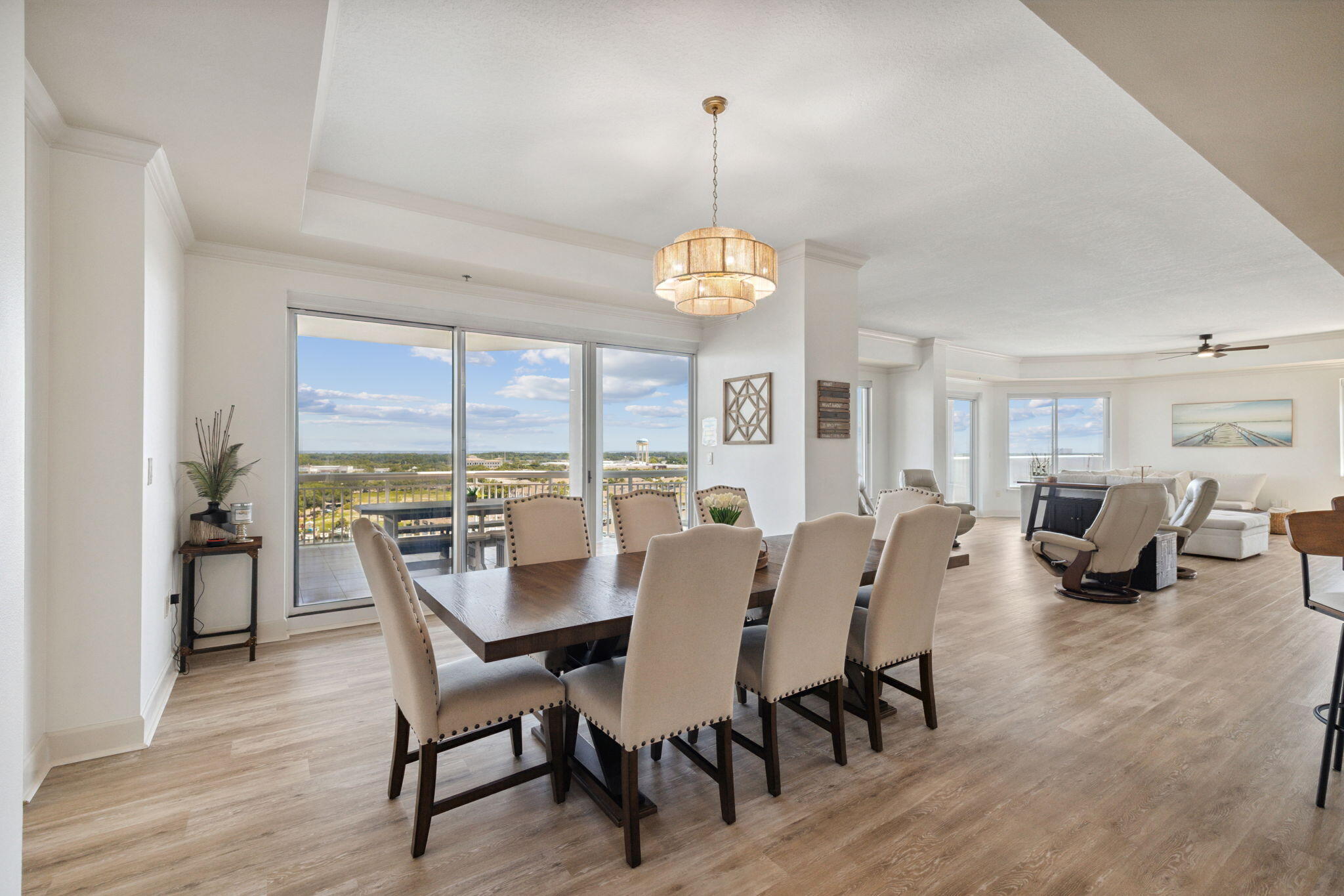 725 Gulf Shore Drive, Unit 902A Destin, FL 32541 - Photo 10 of 102 a view of a dining room with furniture window and wooden floor