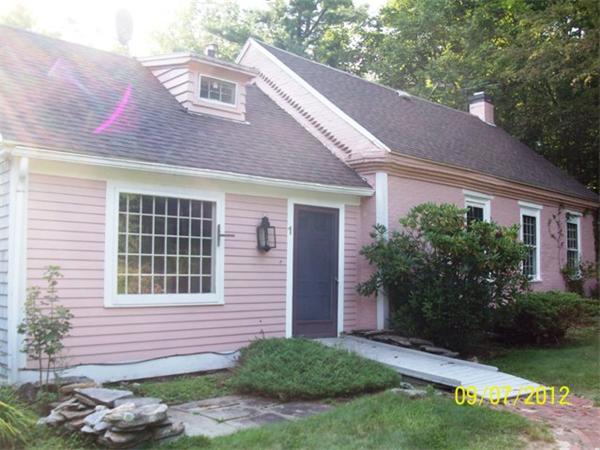 1 Rhodes Road Princeton, MA 01541 - Photo 1 of 8 a front view of a house with garden