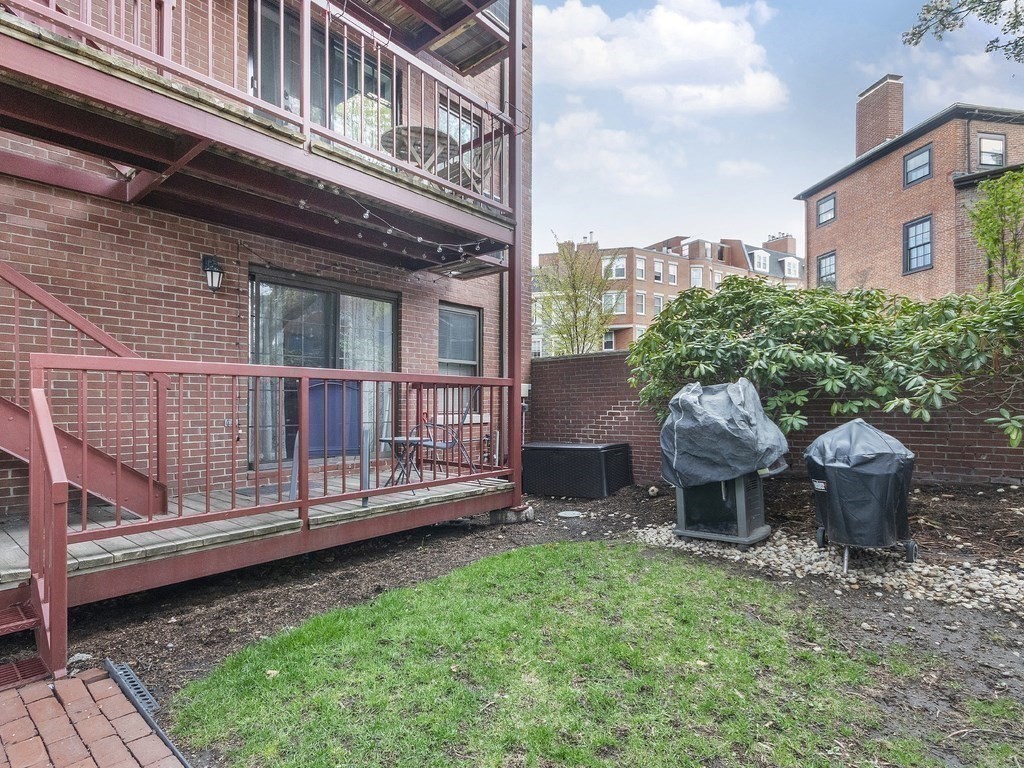 100 Main Street, Unit 2 Boston, MA 02129 - Photo 15 of 18 a view of a house with a yard