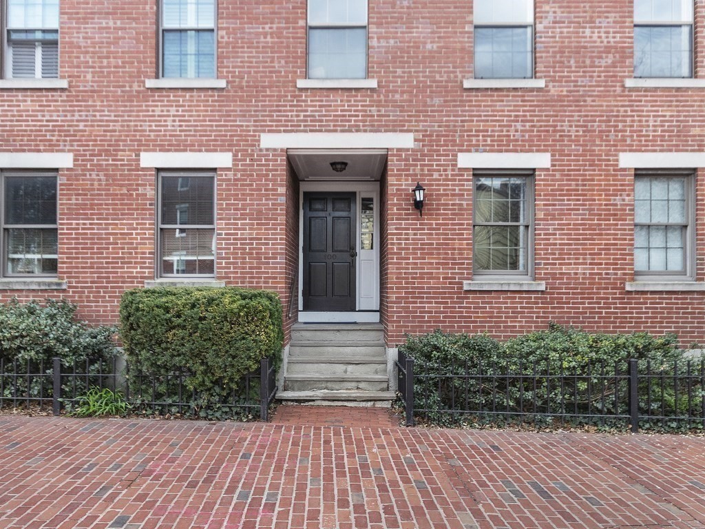 100 Main Street, Unit 2 Boston, MA 02129 - Photo 2 of 18 a front view of a house with a yard