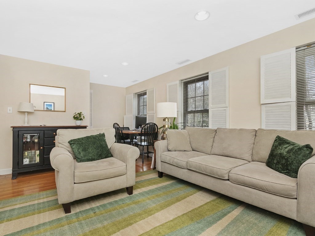 100 Main Street, Unit 2 Boston, MA 02129 - Photo 5 of 18 a living room with furniture and a couch