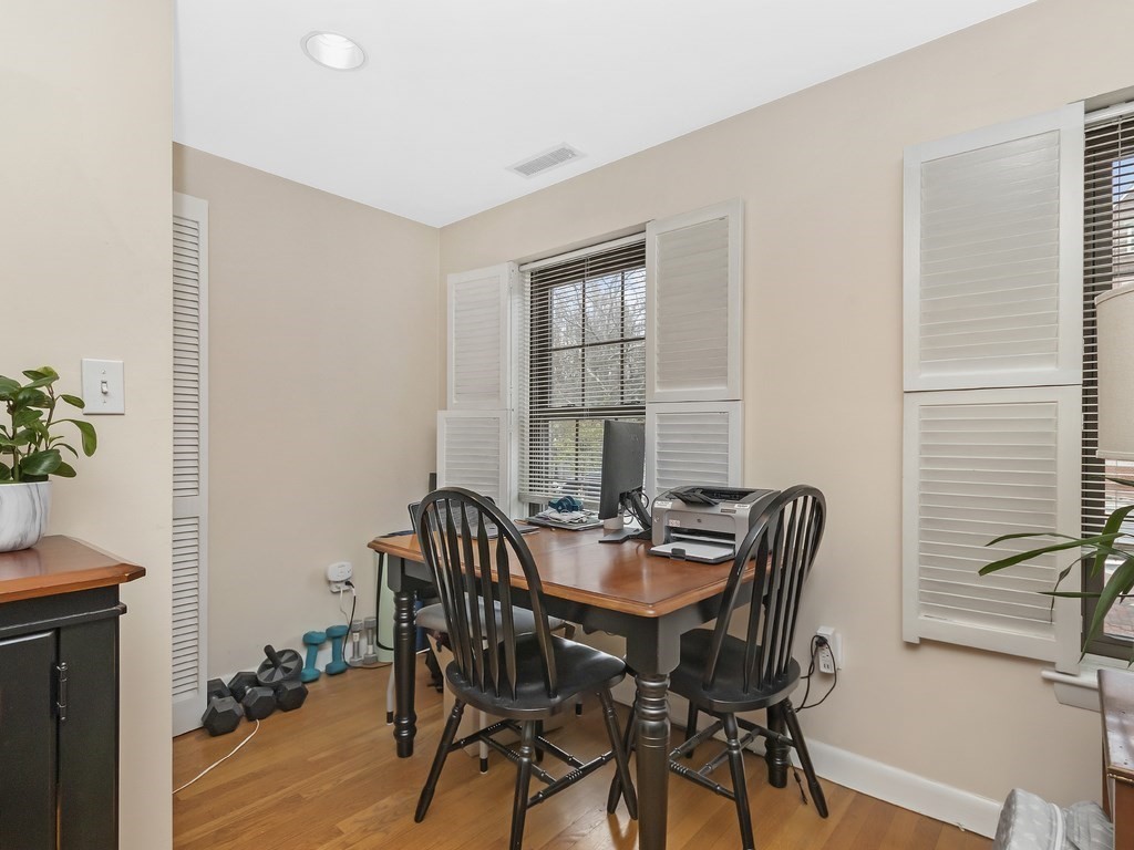 100 Main Street, Unit 2 Boston, MA 02129 - Photo 6 of 18 a view of a dining room with furniture and wooden floor