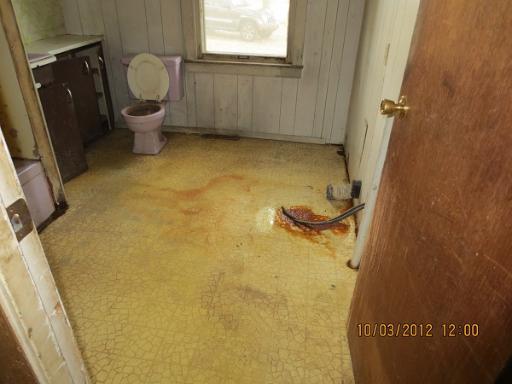 16080 Pratt Road Sandwich, IL 60548 - Photo 6 of 13 a bathroom with a sink and a toilet