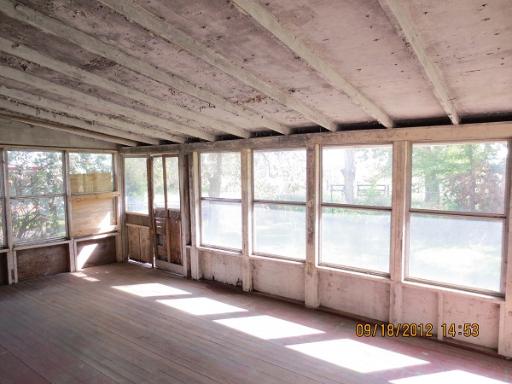 16080 Pratt Road Sandwich, IL 60548 - Photo 9 of 13 a view of an empty room with a window