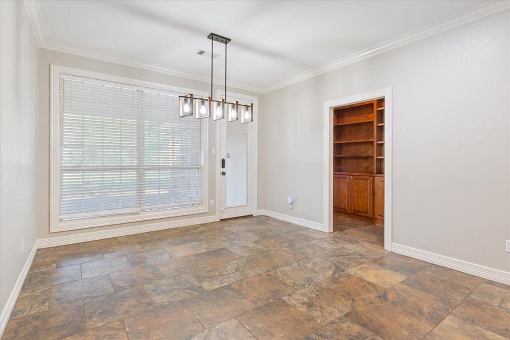 9412 Silverthorn Drive Waco, TX 76708 - Photo 6 of 16 a view of empty room with a fireplace