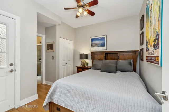 a bedroom with a bed and window