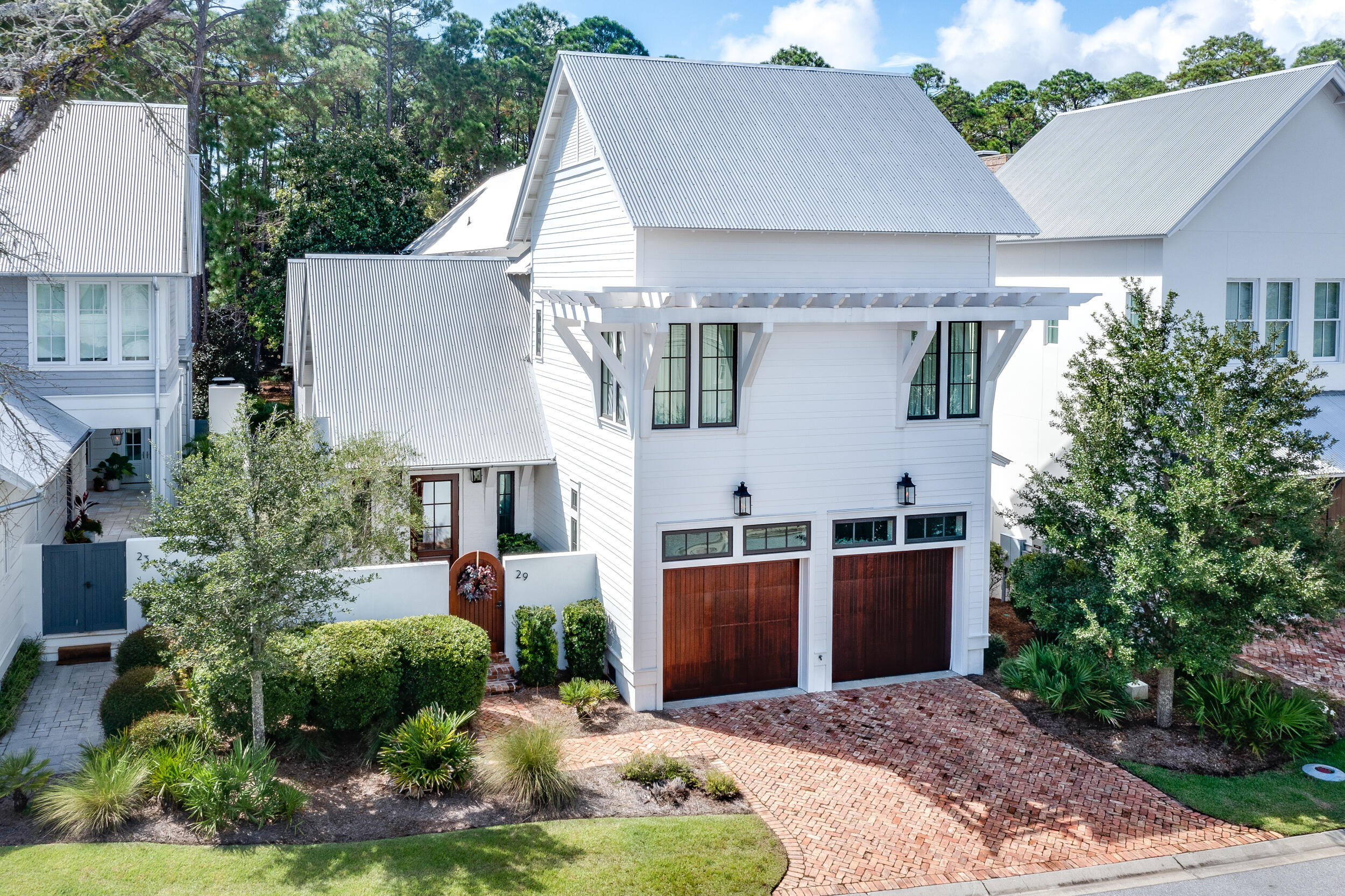 a aerial view of a house with yard