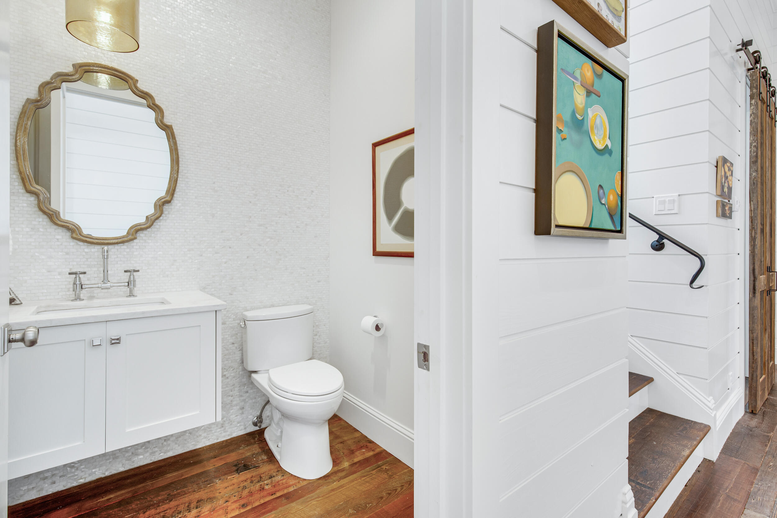 29 Bennett Santa Rosa Beach, FL 32459 - Photo 11 of 60 a bathroom with a toilet a sink and mirror