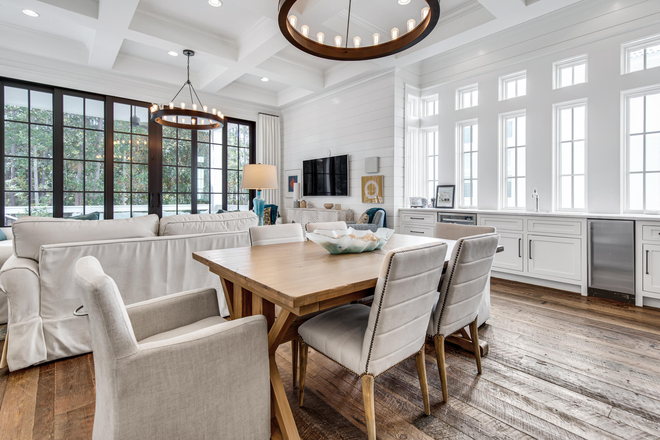 29 Bennett Santa Rosa Beach, FL 32459 - Photo 16 of 60 a view of a dining room with furniture a chandelier and wooden floor