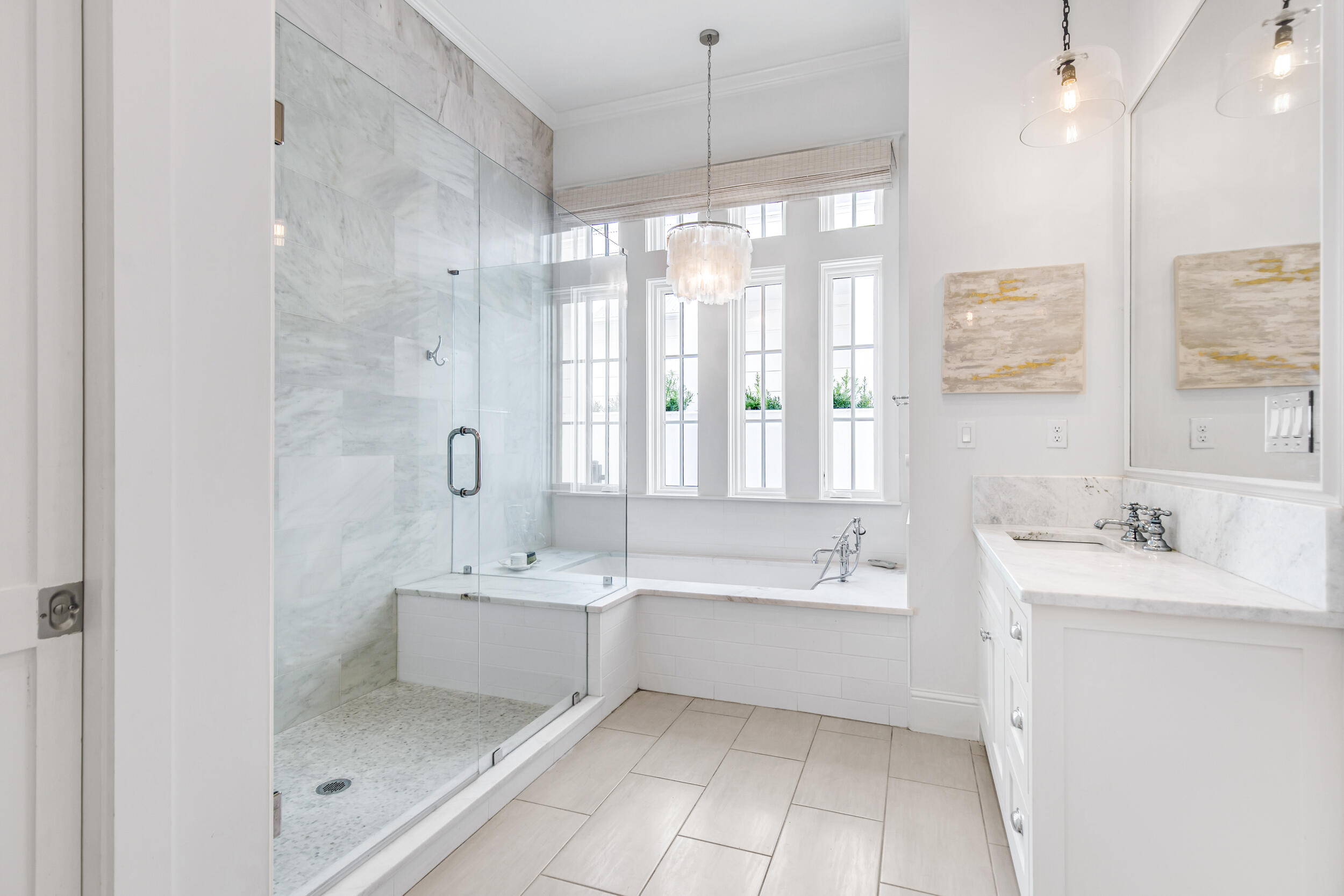 29 Bennett Santa Rosa Beach, FL 32459 - Photo 22 of 60 a bathroom with a bathtub shower sink vanity and a mirror