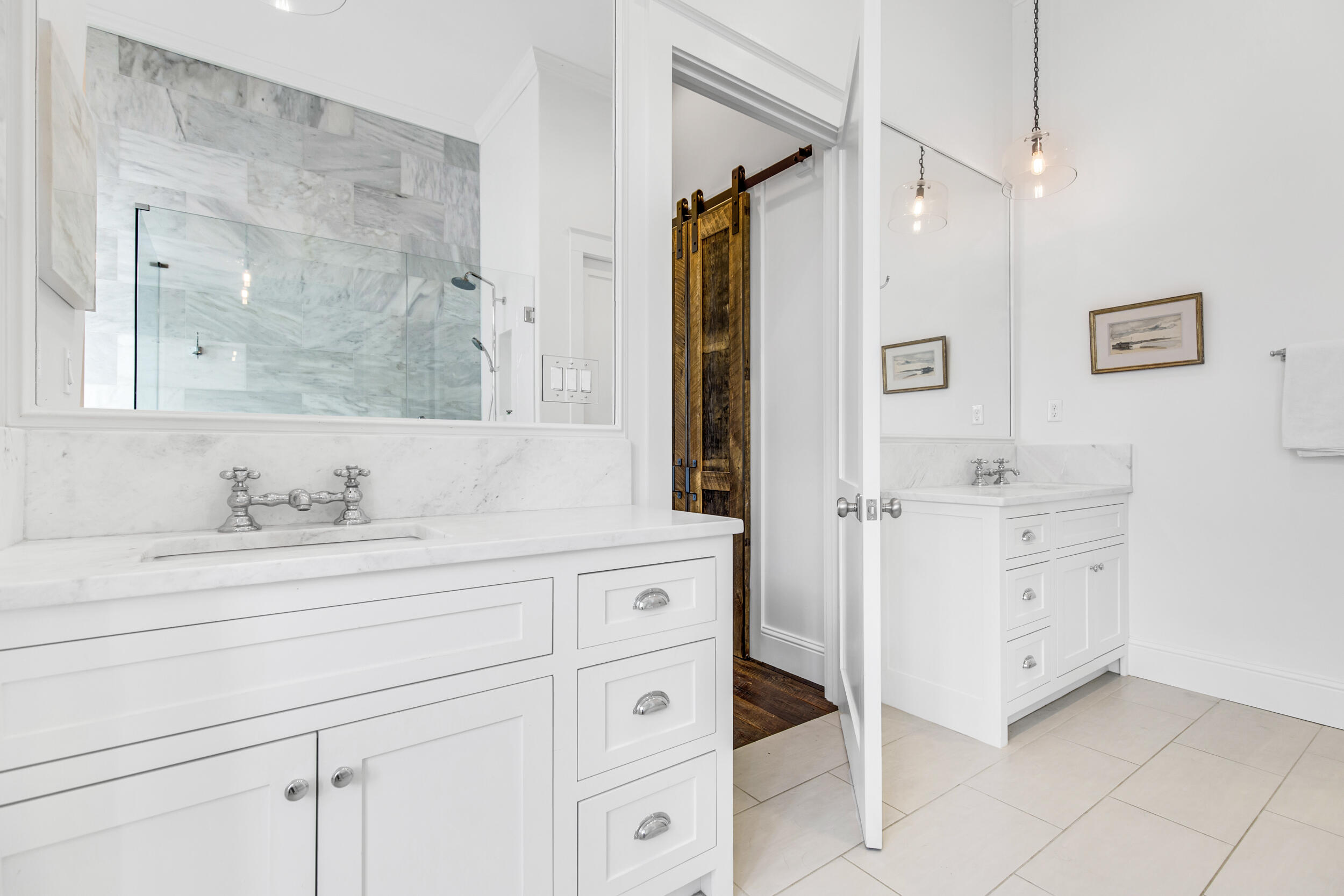 29 Bennett Santa Rosa Beach, FL 32459 - Photo 23 of 60 a bathroom with a sink a vanity and a mirror