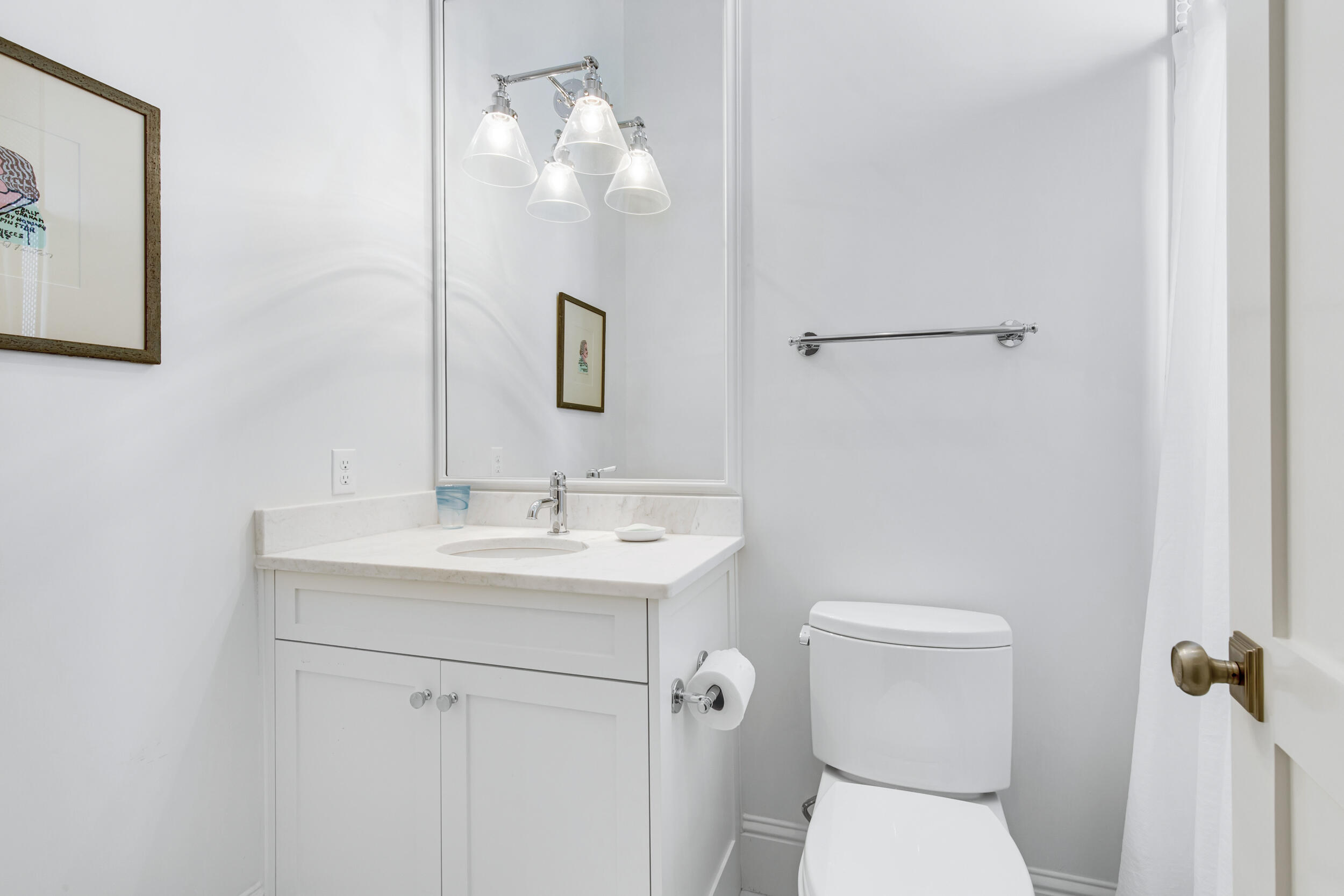29 Bennett Santa Rosa Beach, FL 32459 - Photo 37 of 60 a bathroom with a toilet a sink and mirror