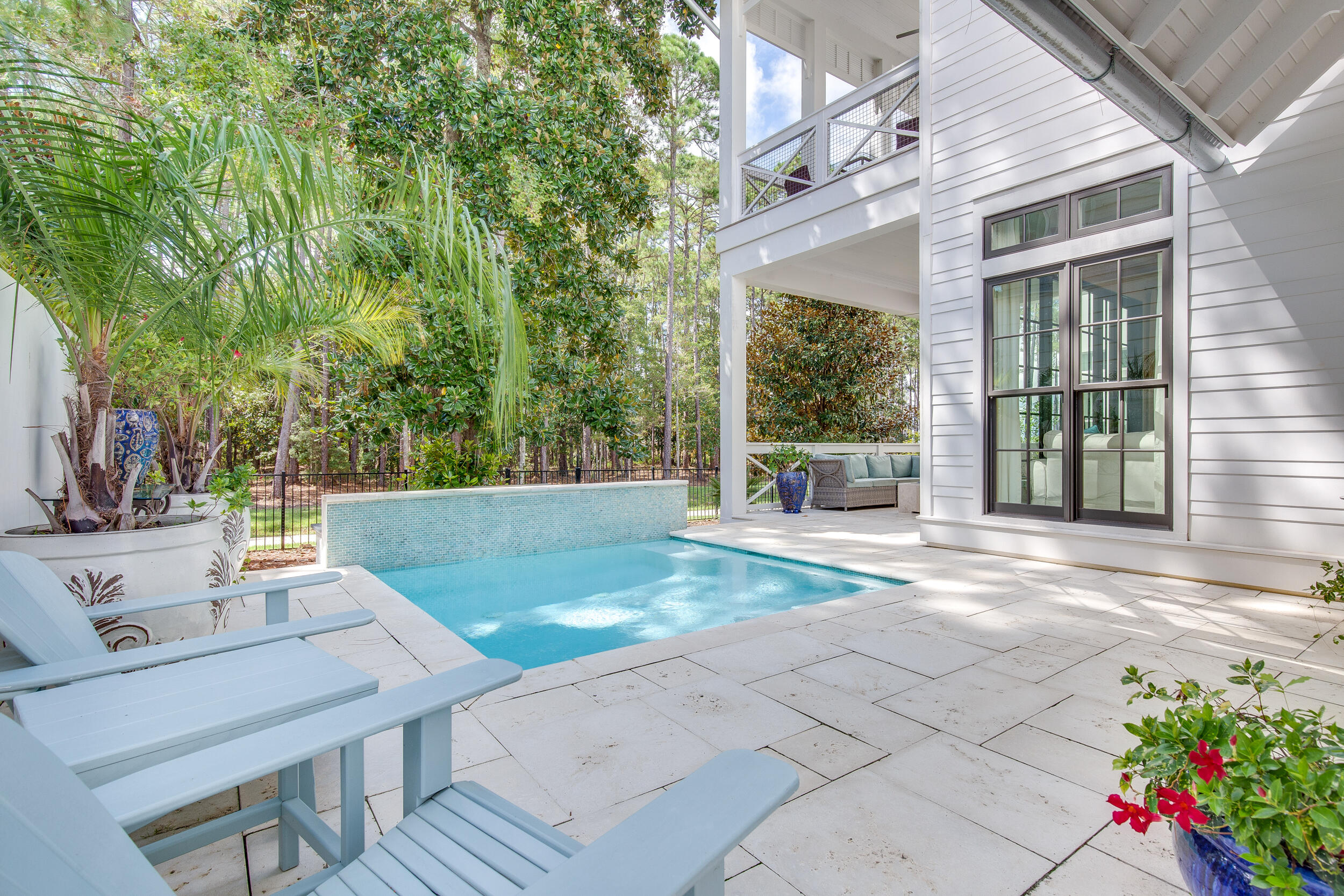 29 Bennett Santa Rosa Beach, FL 32459 - Photo 43 of 60 a view of a patio with couches table and chairs and potted plants