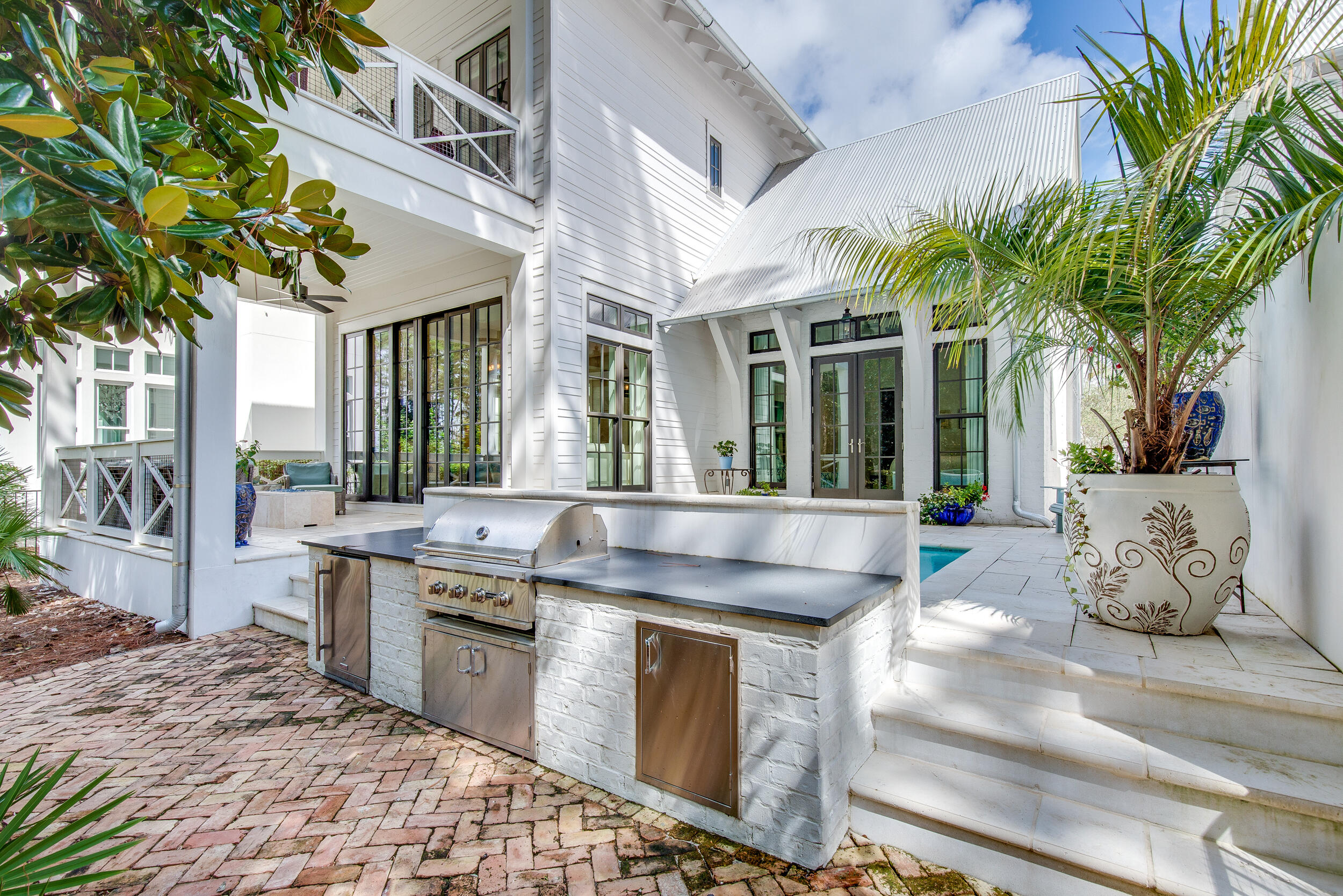 29 Bennett Santa Rosa Beach, FL 32459 - Photo 46 of 60 a view of a kitchen with a stove and a potted plant