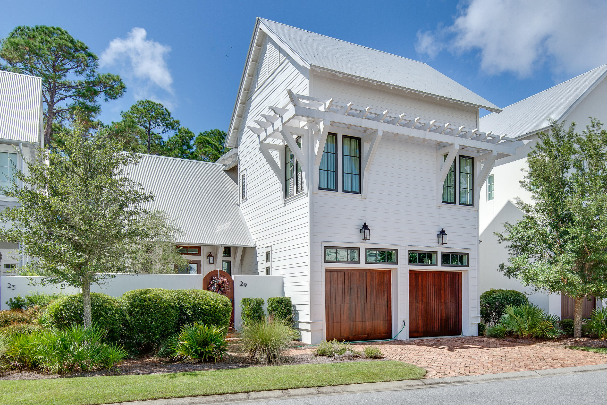29 Bennett Santa Rosa Beach, FL 32459 - Photo 59 of 60 a front view of a house with a garden