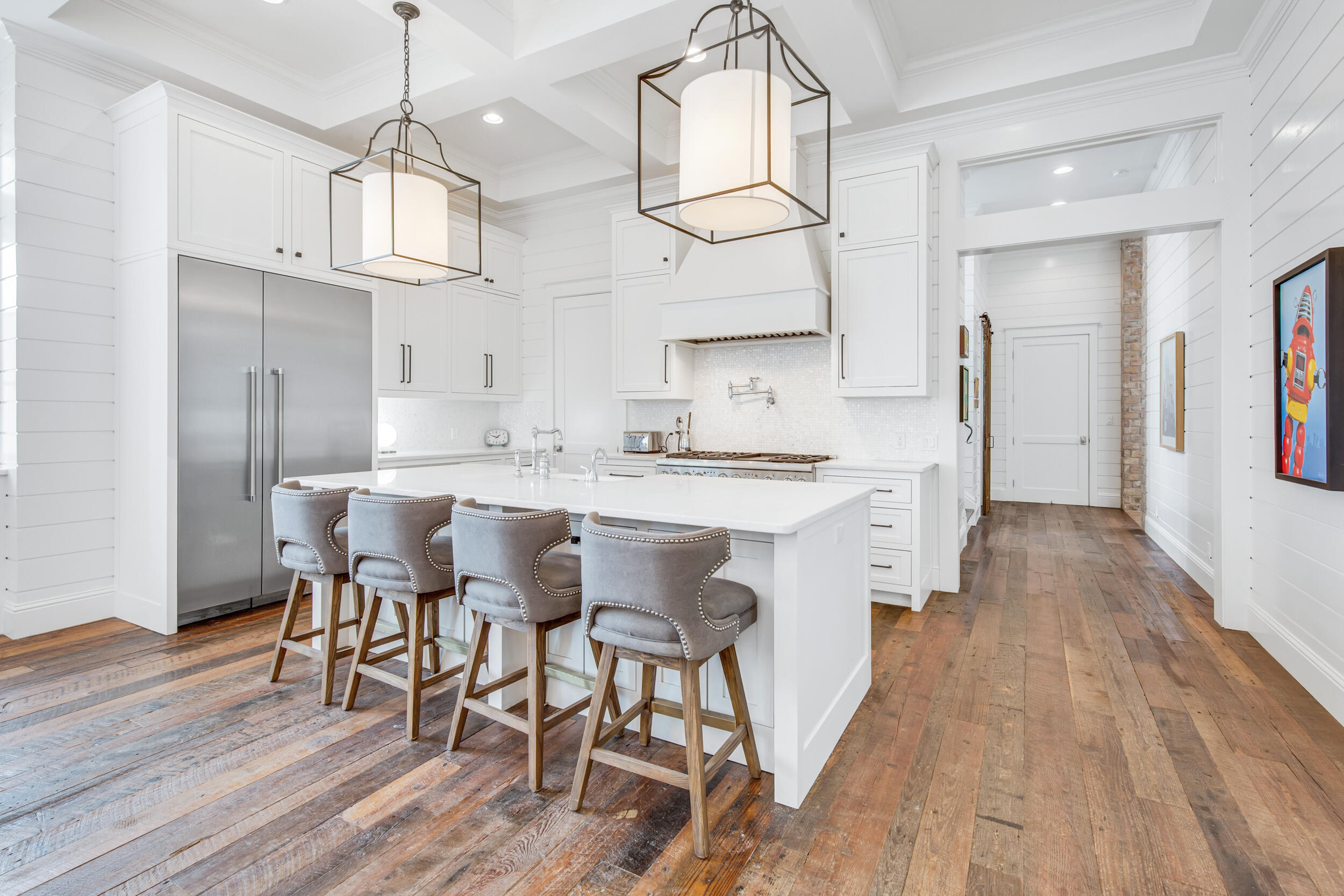 29 Bennett Santa Rosa Beach, FL 32459 - Photo 8 of 60 a kitchen with stainless steel appliances a table chairs refrigerator and microwave