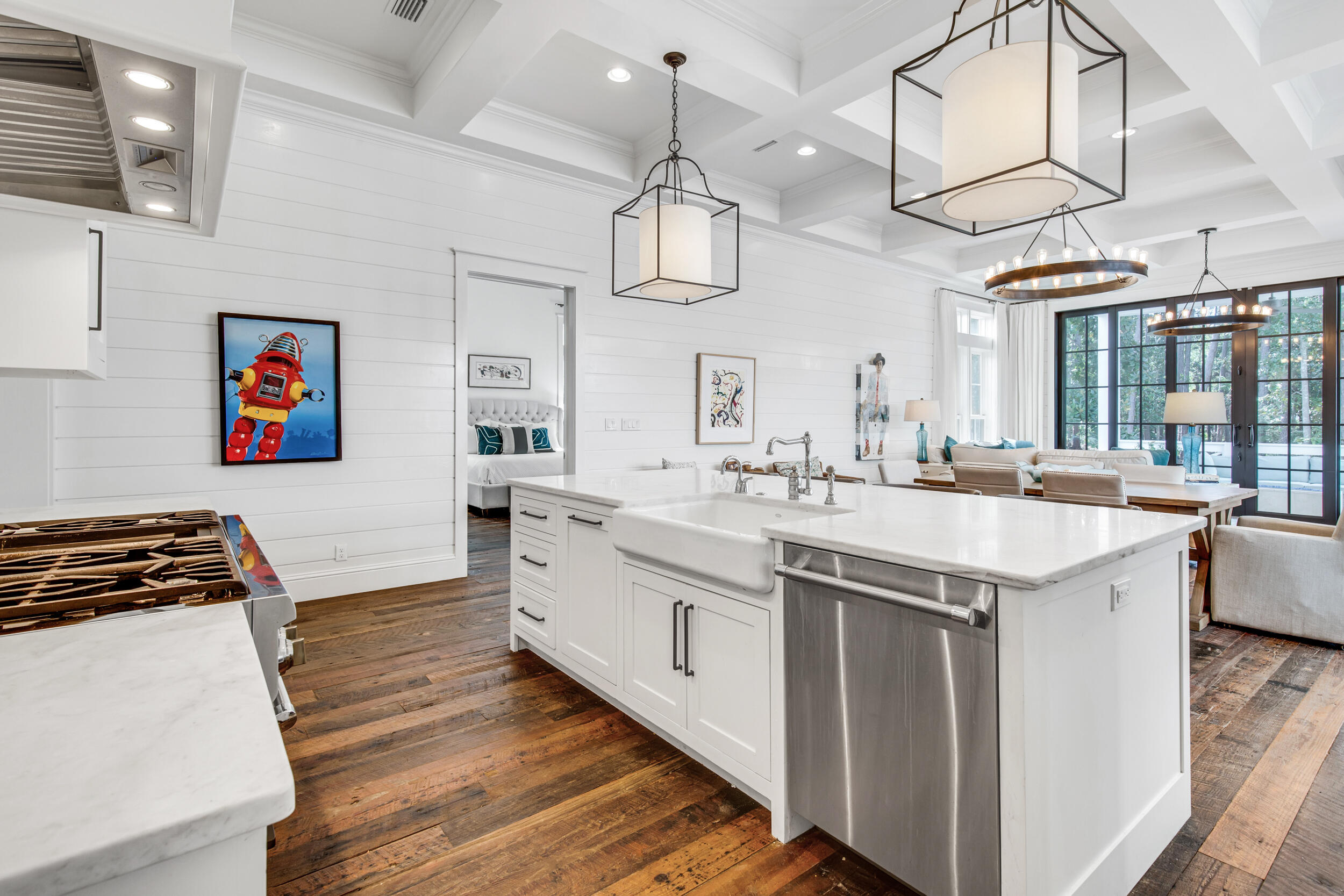 29 Bennett Santa Rosa Beach, FL 32459 - Photo 9 of 60 a kitchen with stainless steel appliances granite countertop a sink and dishwasher with white cabinets