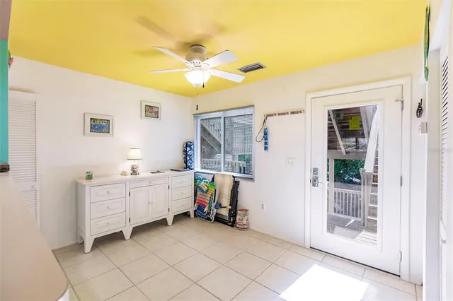 a bed room with a bed and a window