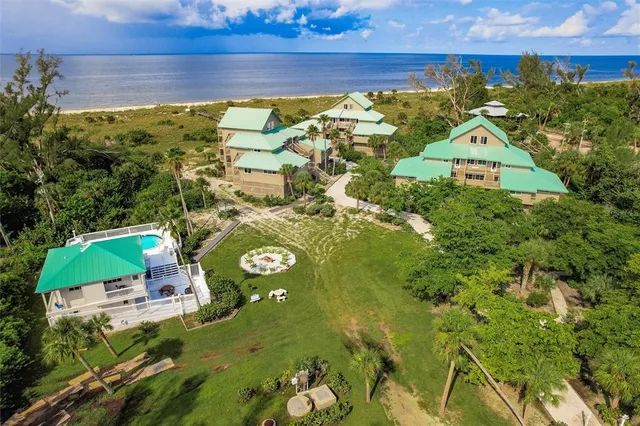 an aerial view of a house with a garden