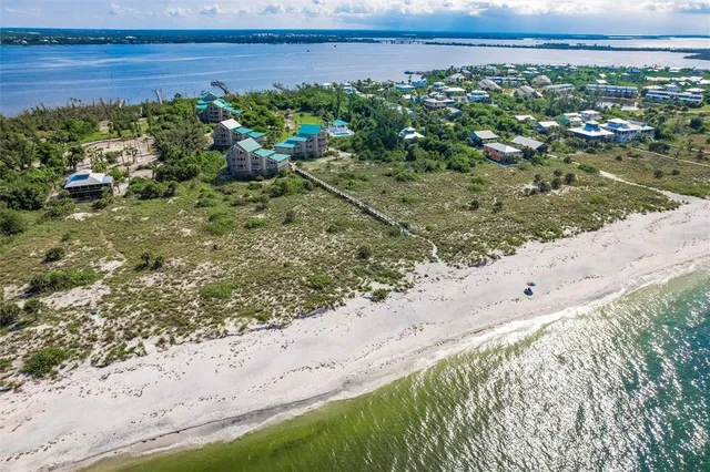 a view of a lake with beach