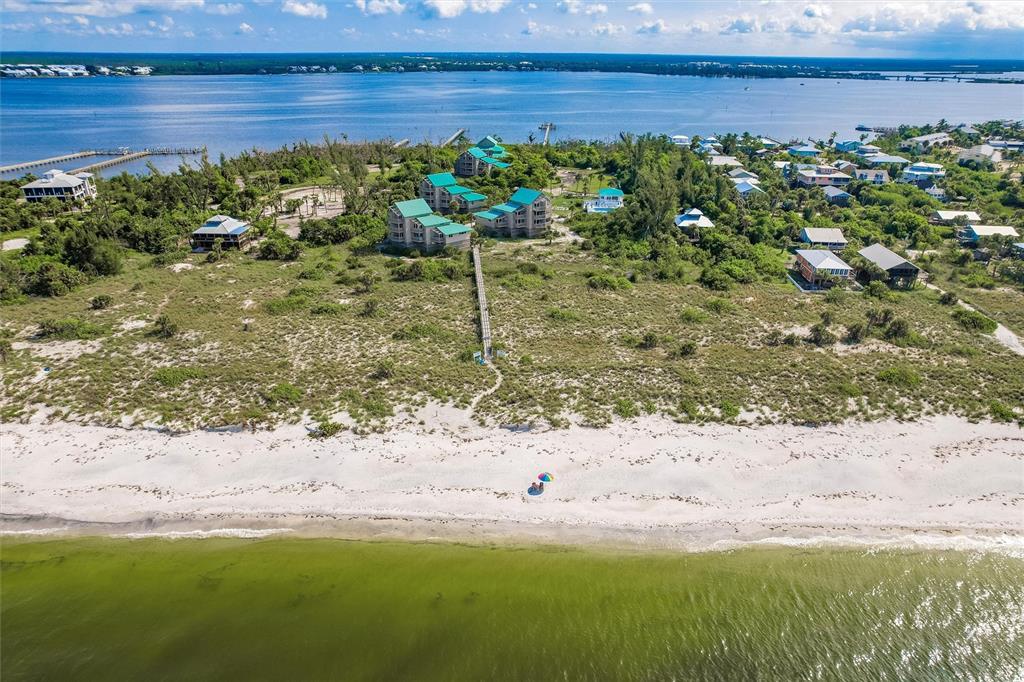 9200 Little Gasparilla, Unit 203 Placida, FL 33946 - Photo 37 of 41 a view of a yard with an outdoor space