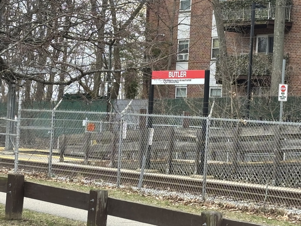 1122 Adams Street, Unit 2 Boston, MA 02124 - Photo 19 of 21 a view of a glass building from a window