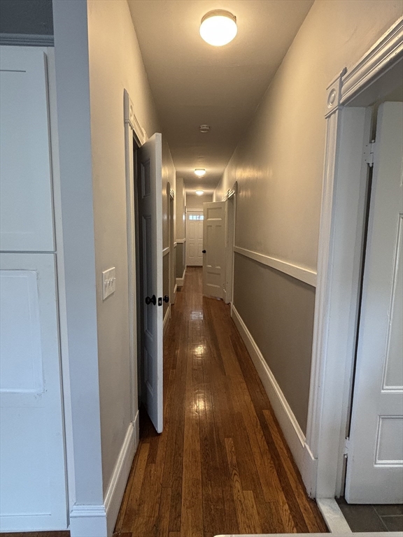 1122 Adams Street, Unit 2 Boston, MA 02124 - Photo 10 of 21 a view of gallery with wooden floor