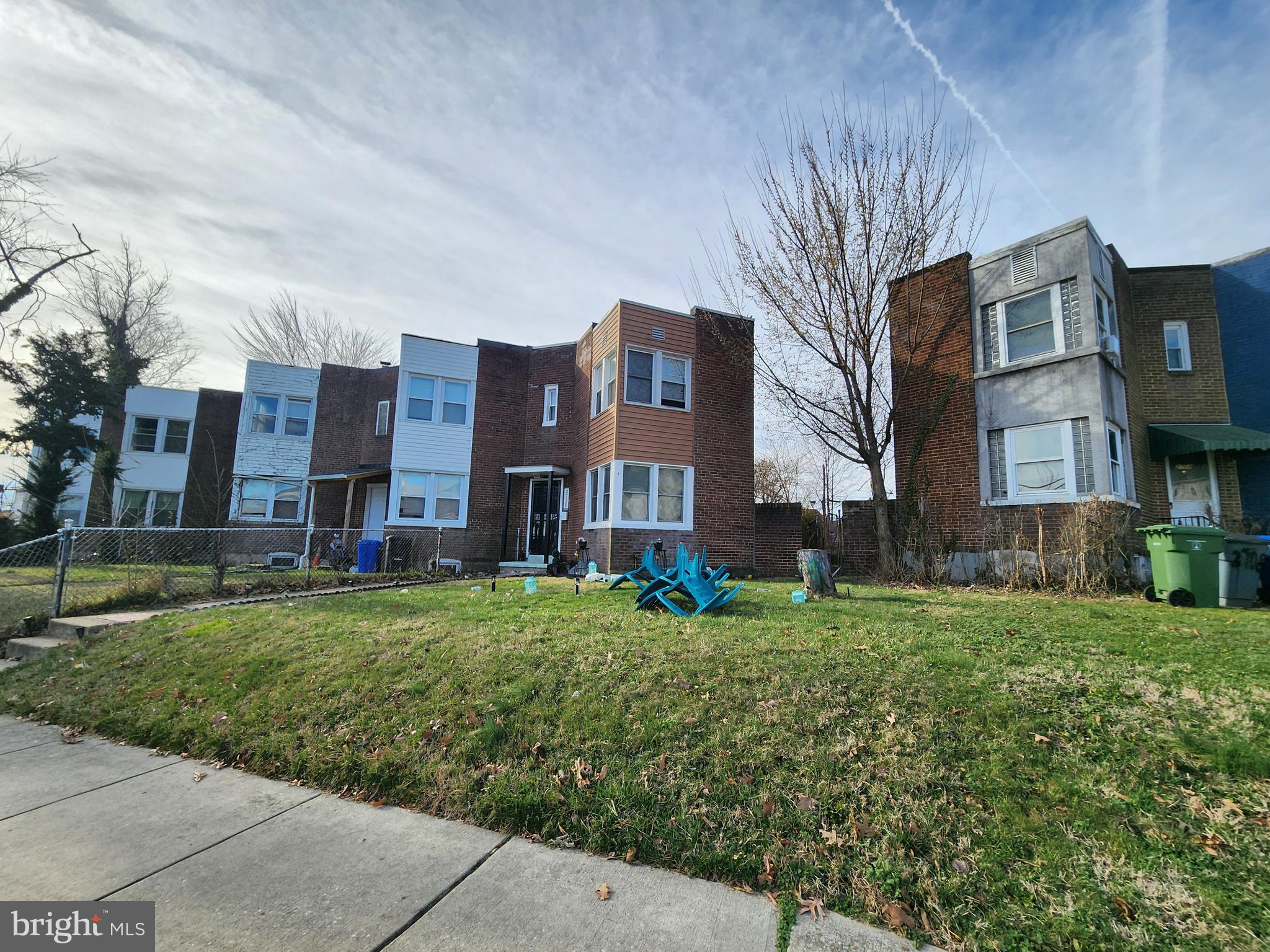 2710 Woodview Road Baltimore, MD 21225 - Photo 4 of 17 a view of a brick building next to a yard