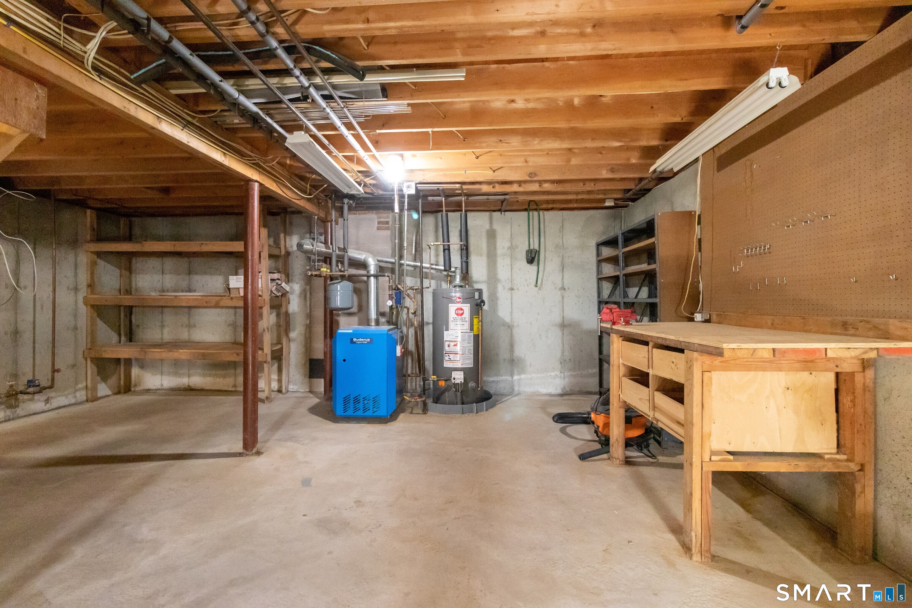 15 Kennedy Road Windsor, CT 06095 - Photo 33 of 40 Workshop area with workbench