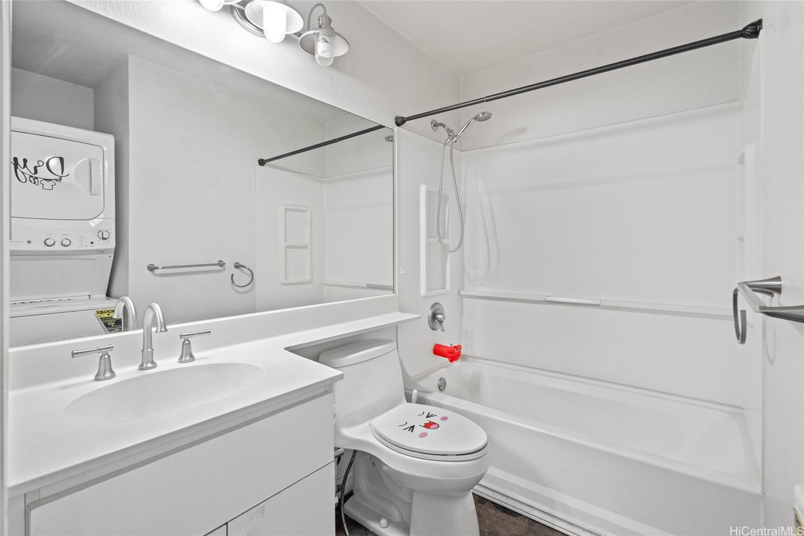 91-299 Hanapouli Circle, Unit 1C Ewa Beach, HI 96706 - Photo 15 of 25 a bathroom with a sink toilet and shower