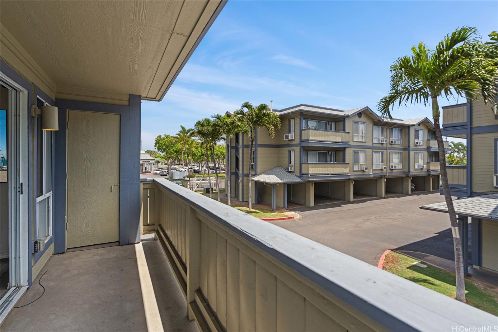 91-299 Hanapouli Circle, Unit 1C Ewa Beach, HI 96706 - Photo 19 of 25 a view of building with an outdoor space