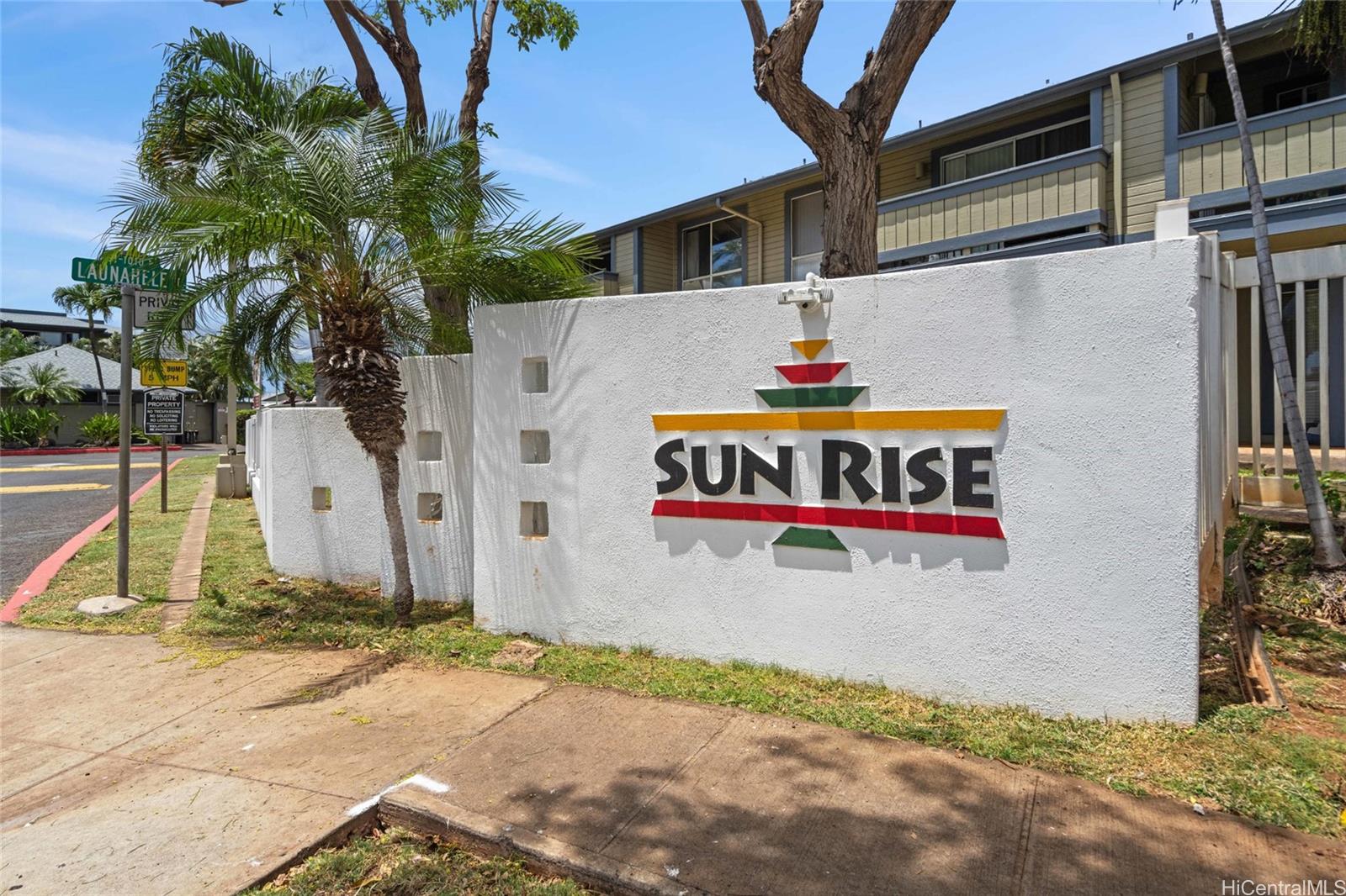 91-299 Hanapouli Circle, Unit 1C Ewa Beach, HI 96706 - Photo 20 of 25 a sign on the side of a building