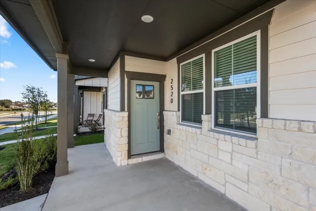 a view of a porch of a house