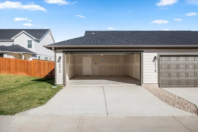 a view of backyard of garage