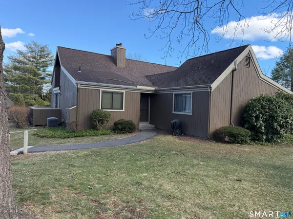 a house view with a backyard space