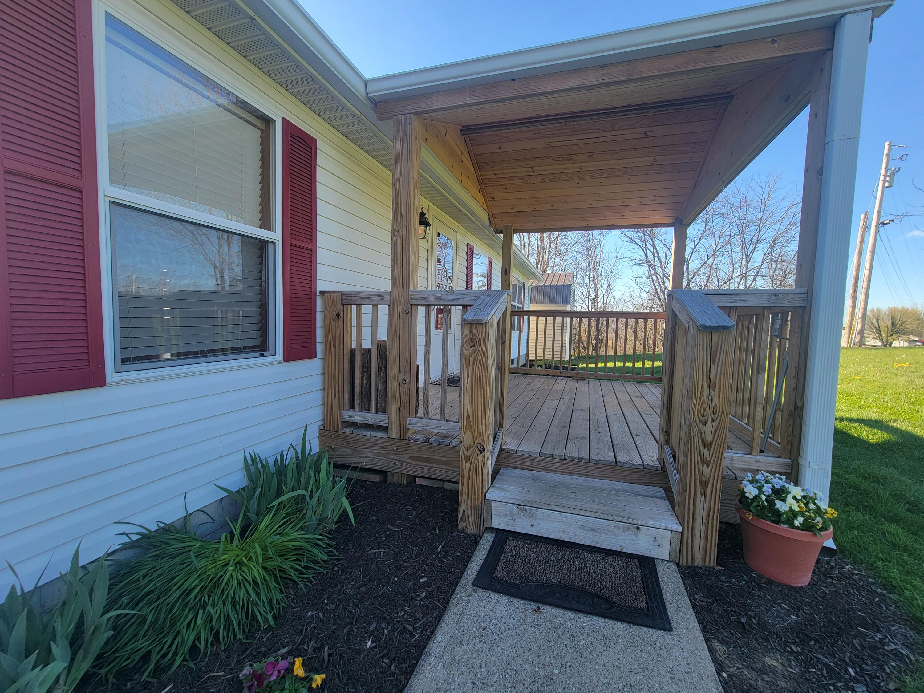 278 Luke Road Sadieville, KY 40370 - Photo 4 of 47 Covered front porch, nice landscaping.