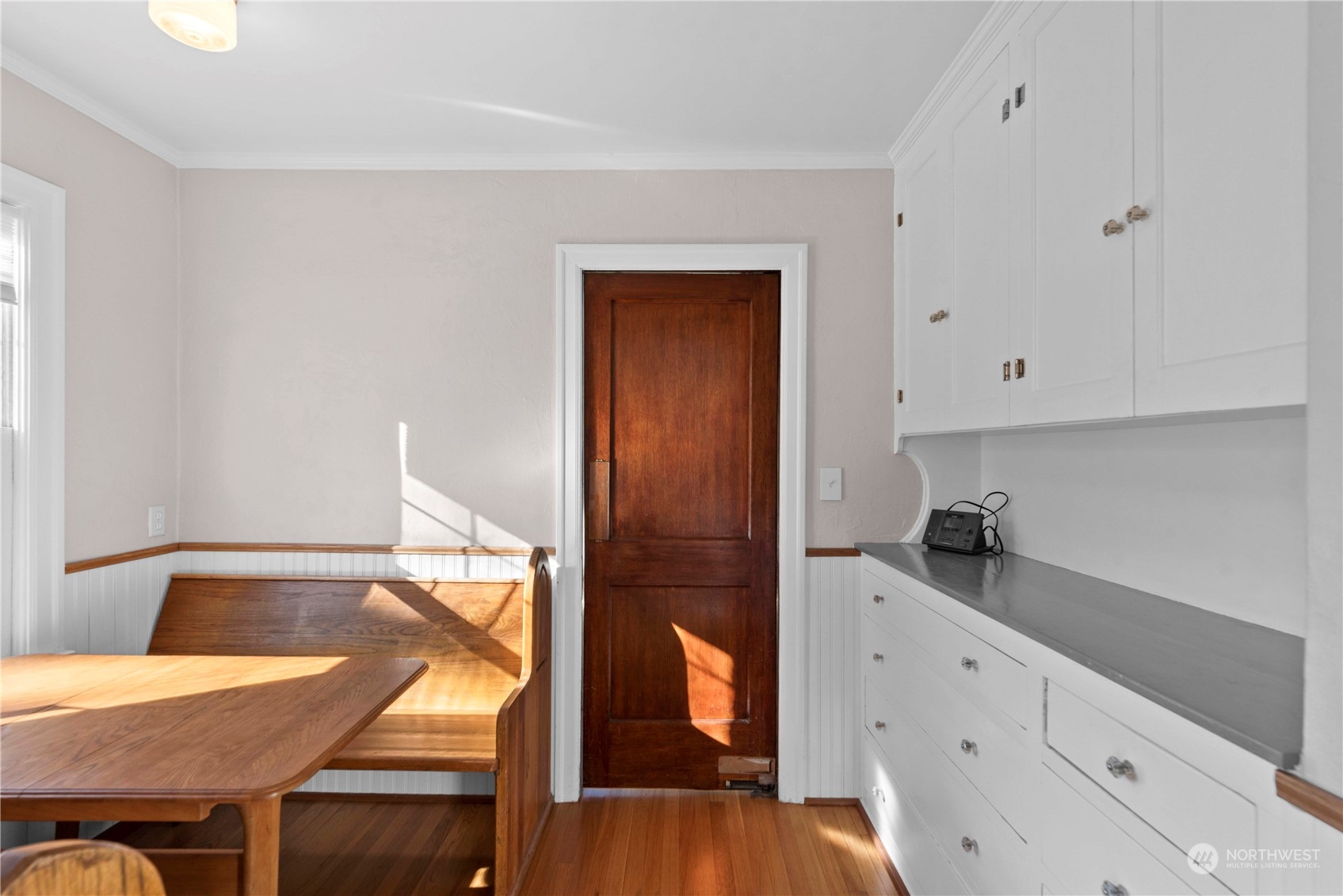 618 Hawthorne Street Wenatchee, WA 98801 - Photo 11 of 37 a kitchen with a table chairs and cabinets