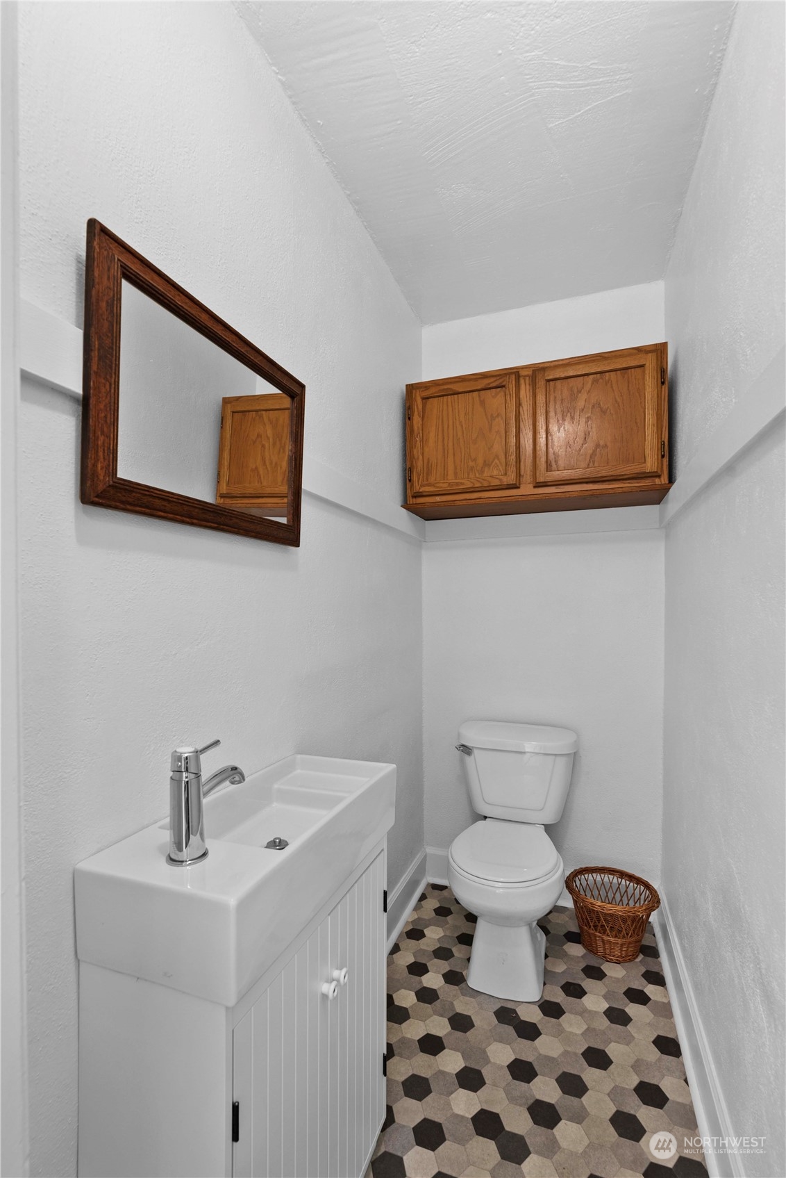 618 Hawthorne Street Wenatchee, WA 98801 - Photo 15 of 37 a bathroom with a sink a toilet and mirror