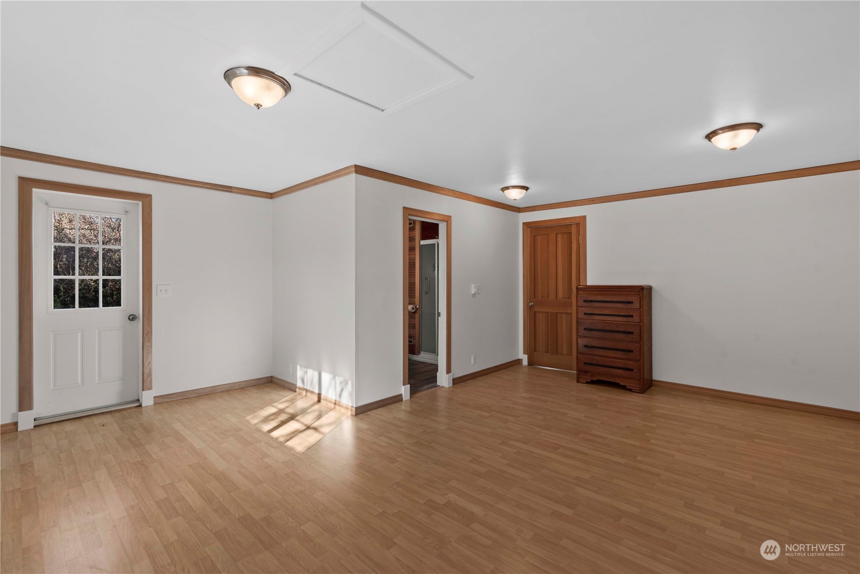 618 Hawthorne Street Wenatchee, WA 98801 - Photo 28 of 37 a view of an empty room with wooden floor and a window