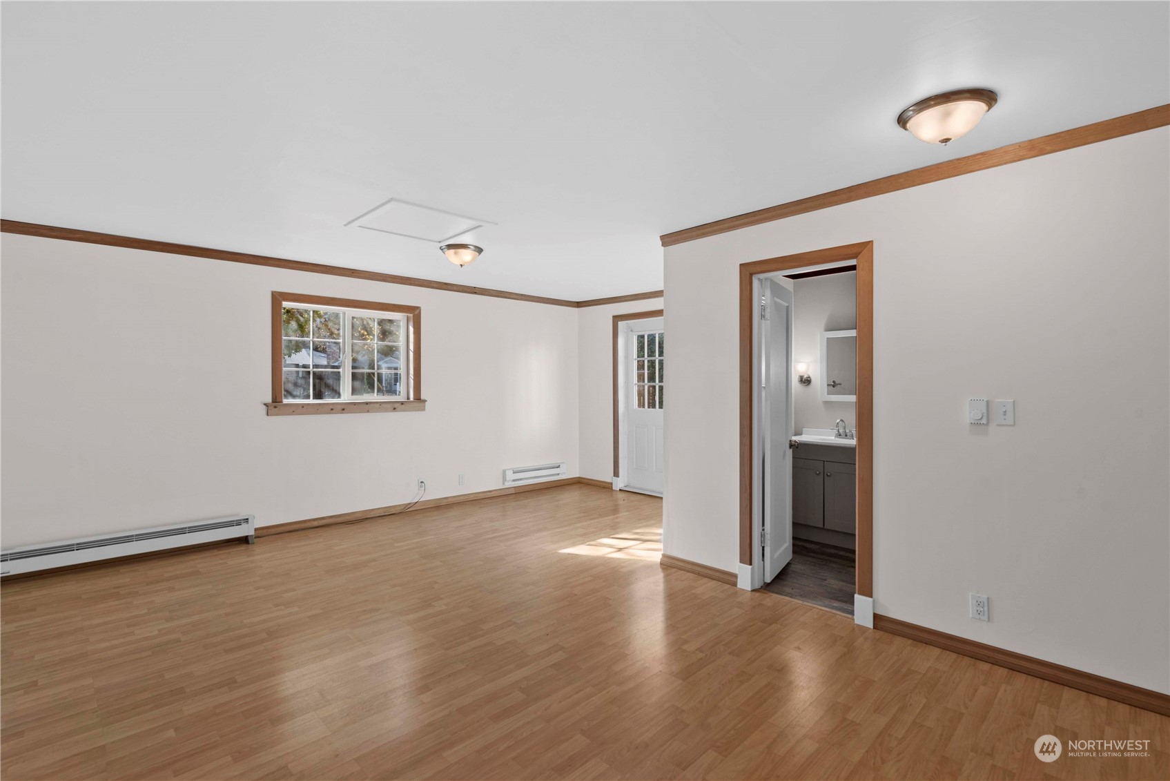 618 Hawthorne Street Wenatchee, WA 98801 - Photo 30 of 37 an empty room with wooden floor and windows