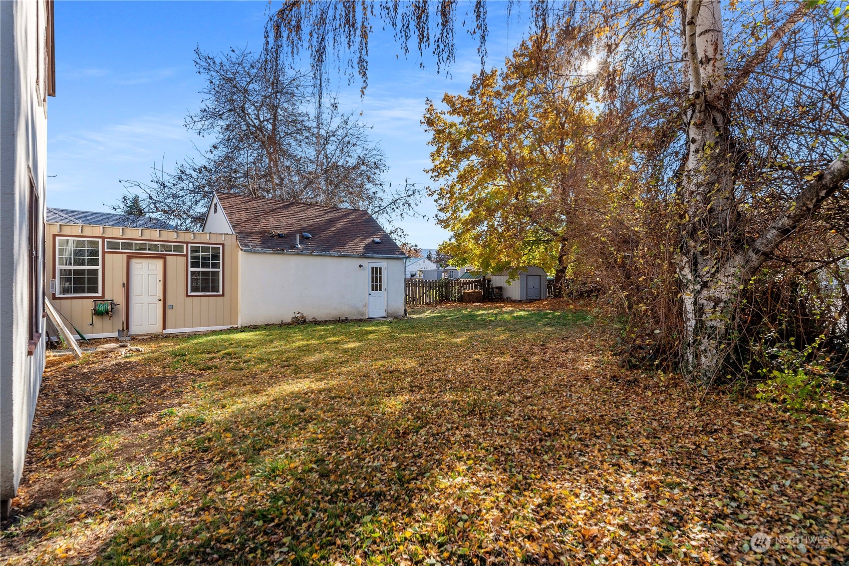 618 Hawthorne Street Wenatchee, WA 98801 - Photo 34 of 37 a view of a house with a yard