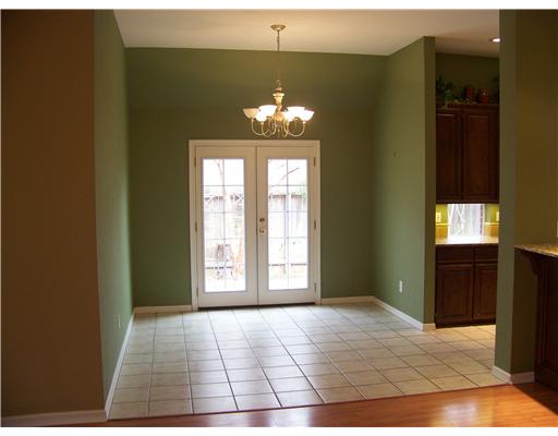 7725 Valley View Drive Corpus Christi, TX 78413 - Photo 4 of 9 a view of an entryway with a chandelier