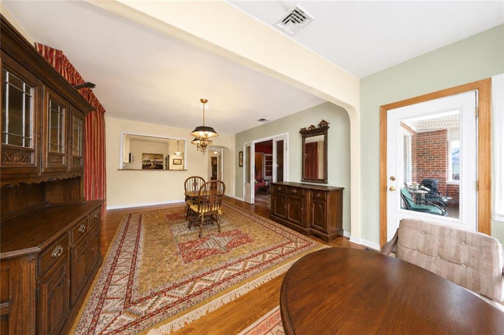 1 Bay Ridge Parkway Brooklyn, NY 11209 - Photo 13 of 38 a living room with furniture and a flat screen tv