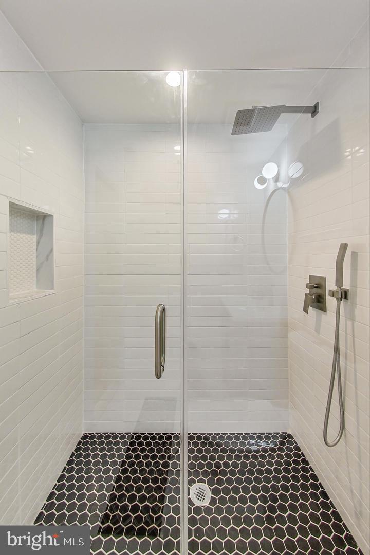 428 Evarts Street Northeast, Unit 2 Washington, DC 20017 - Photo 13 of 37 a bathroom with a shower