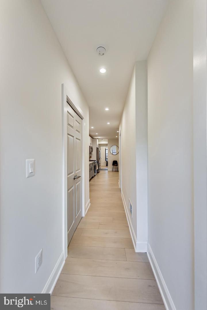 428 Evarts Street Northeast, Unit 2 Washington, DC 20017 - Photo 19 of 37 a view of a hallway with a white walls
