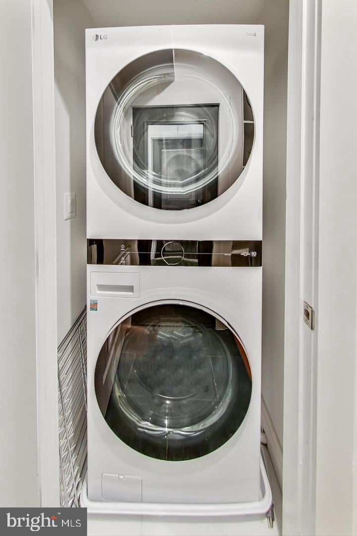 428 Evarts Street Northeast, Unit 2 Washington, DC 20017 - Photo 21 of 37 a utility room with dryer and washer